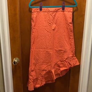 Eyelet asymmetric skirt